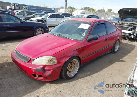 2000 Honda Civic Dx z USA, uszkodzony, nr VIN 1HGEJ6221YL034125